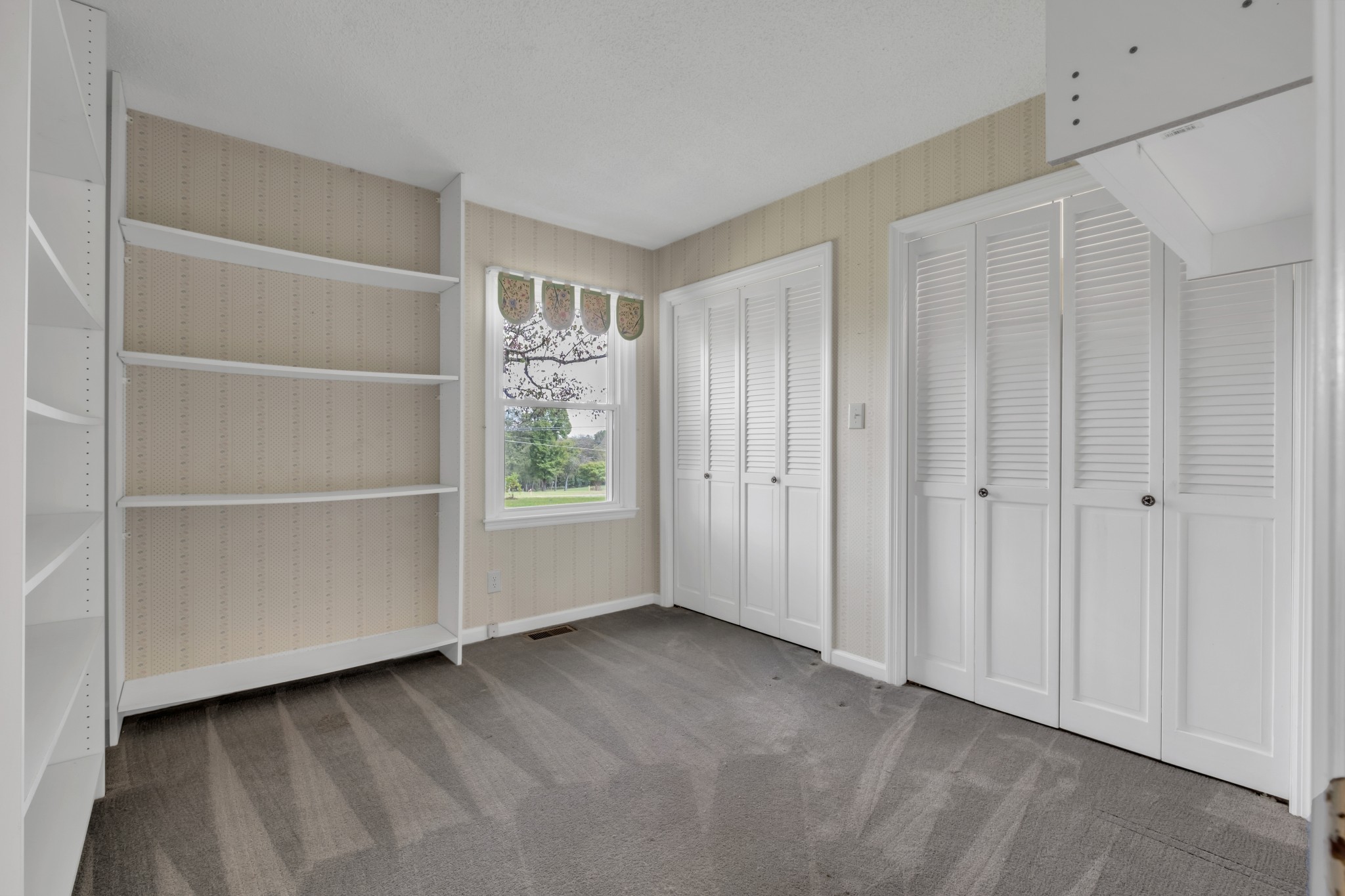 4415 Arno Road Franklin, TN 37064 - Photo 18 of 34 a view of an empty room with a window