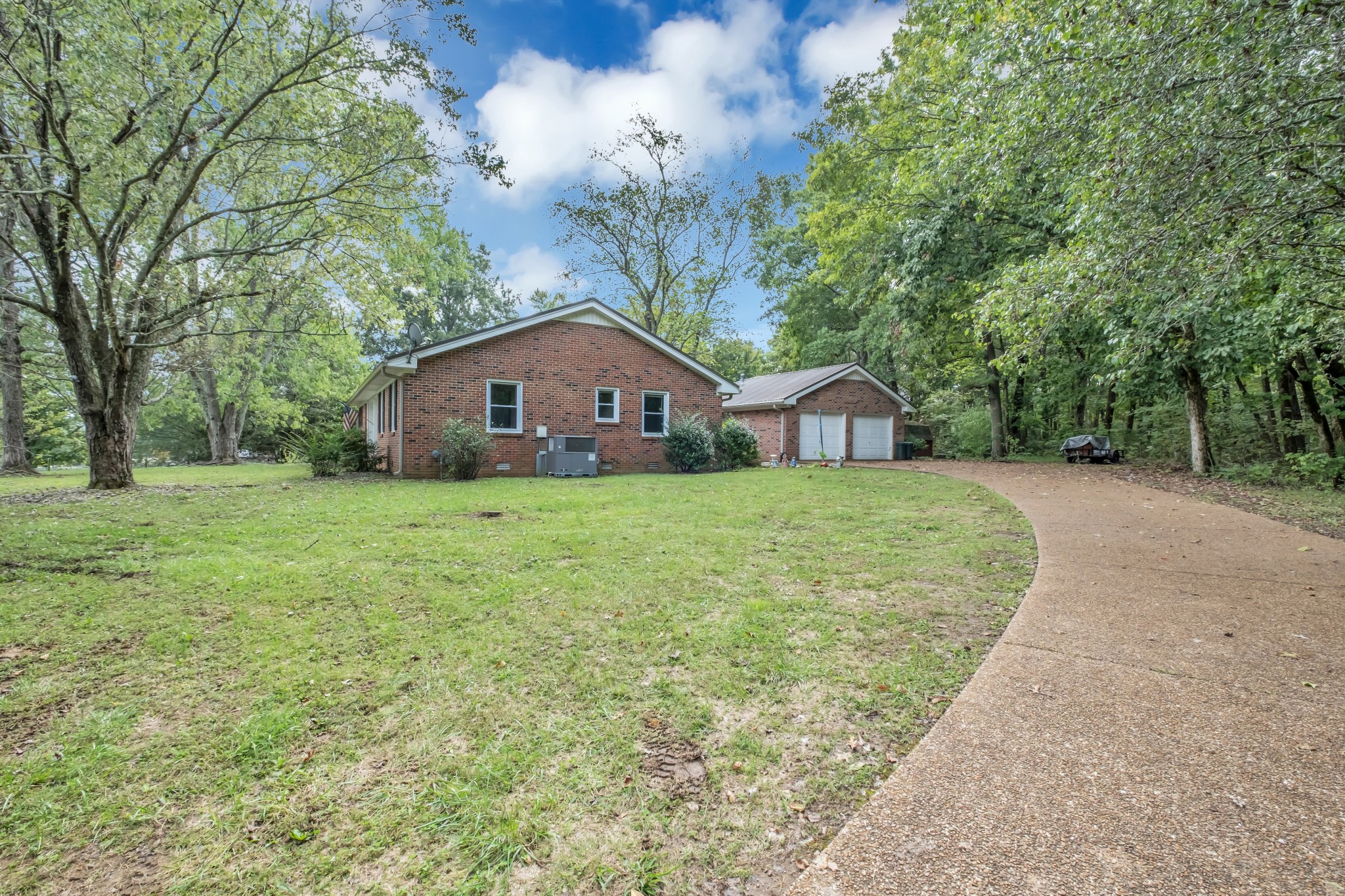 4415 Arno Road Franklin, TN 37064 - Photo 27 of 34 a house with green field in front of it