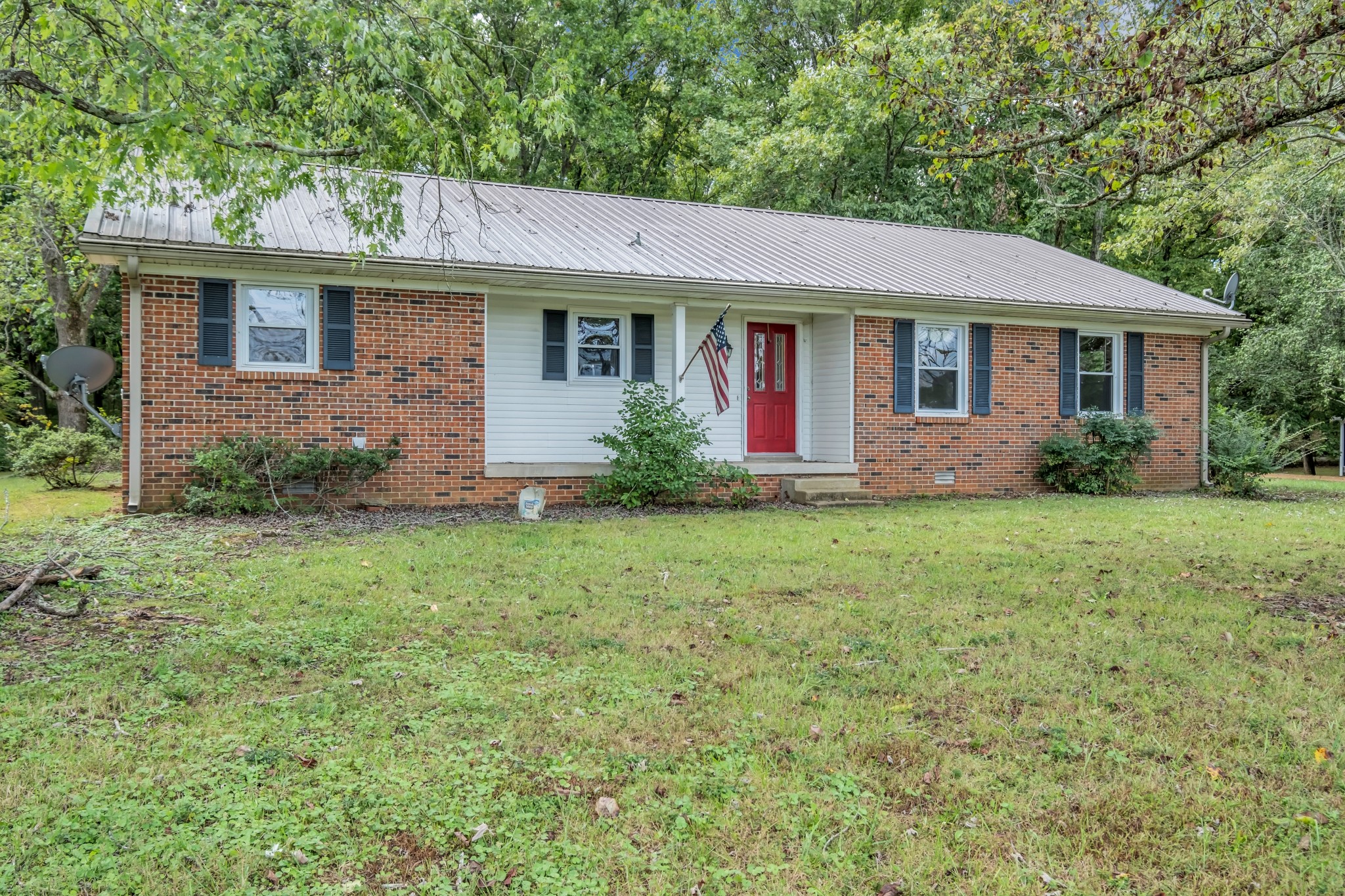 4415 Arno Road Franklin, TN 37064 - Photo 3 of 34 a front view of house with yard and trees