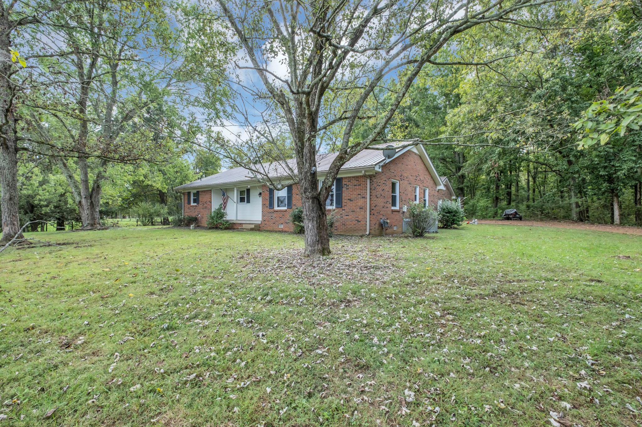 4415 Arno Road Franklin, TN 37064 - Photo 8 of 34 a front view of a house with yard and green space
