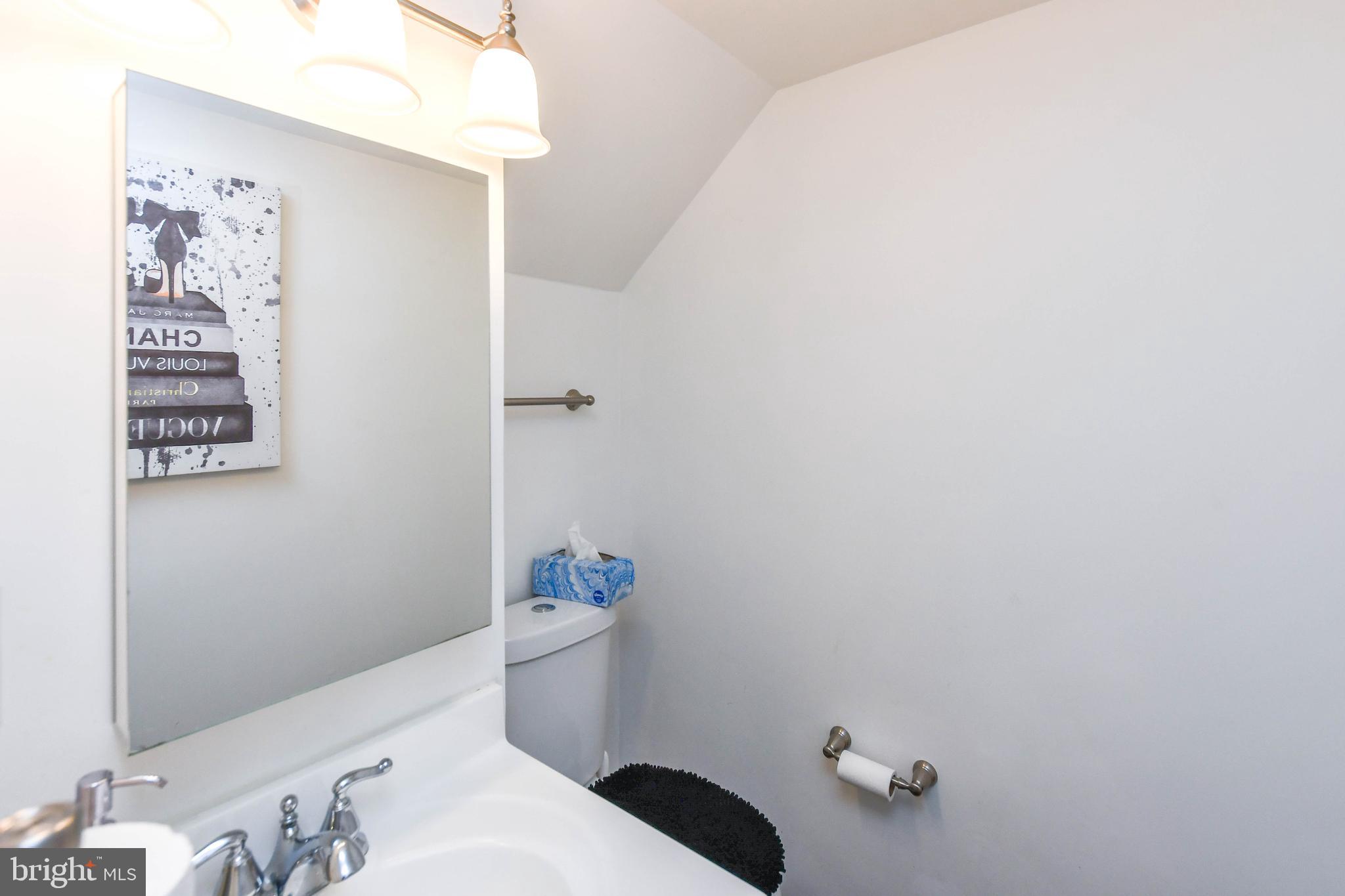 8317 Canning Terrace Greenbelt, MD 20770 - Photo 15 of 50 a bathroom with a bathtub and sink