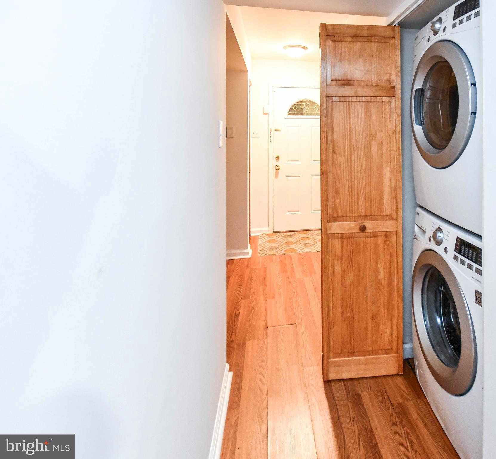8317 Canning Terrace Greenbelt, MD 20770 - Photo 38 of 50 a utility room with dryer and washer
