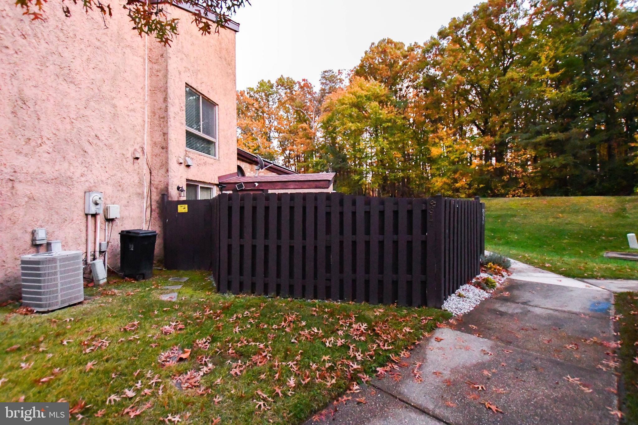 8317 Canning Terrace Greenbelt, MD 20770 - Photo 39 of 50 a view of a backyard with wooden fence