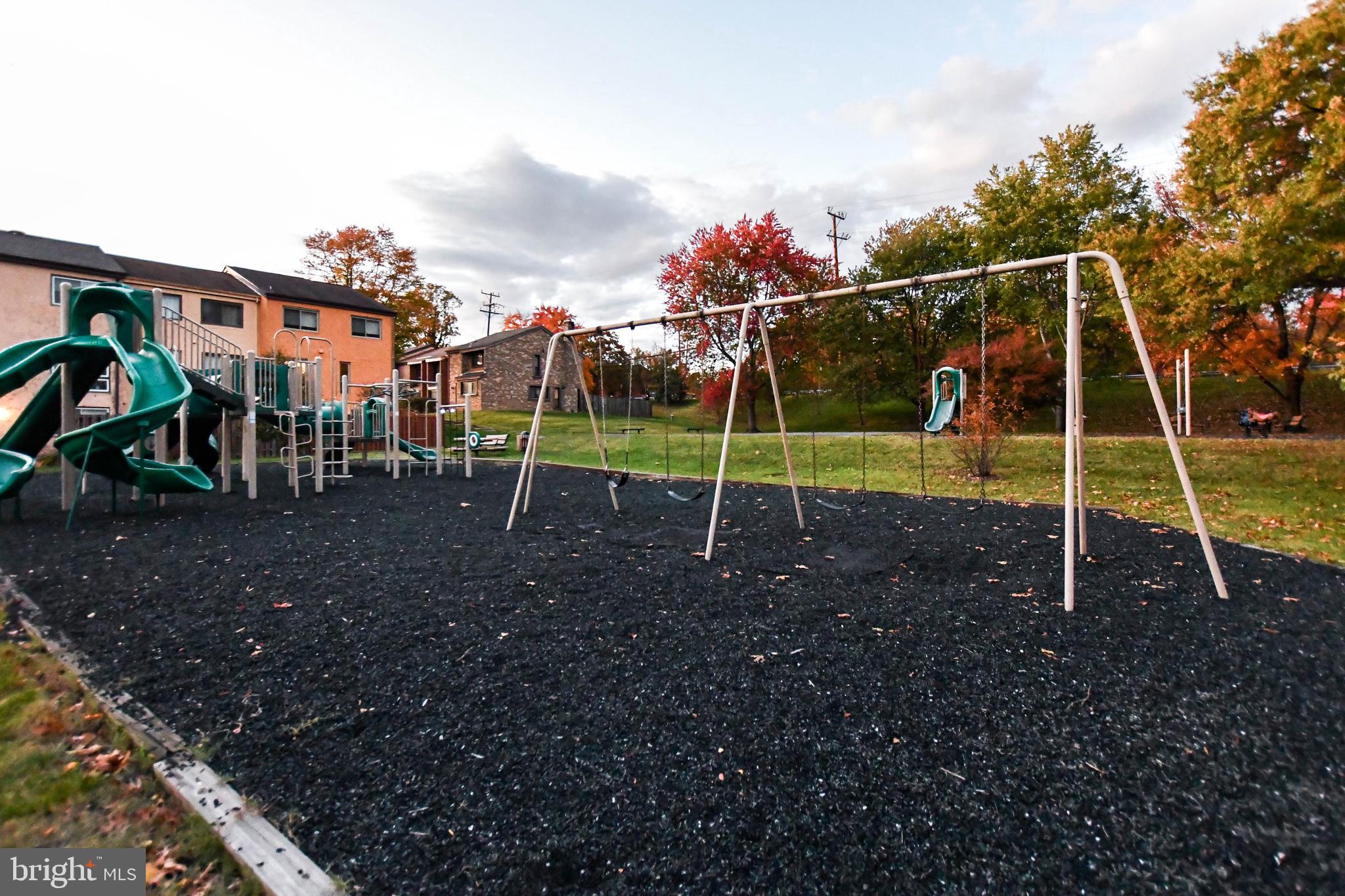 8317 Canning Terrace Greenbelt, MD 20770 - Photo 41 of 50 a view of a park with swings