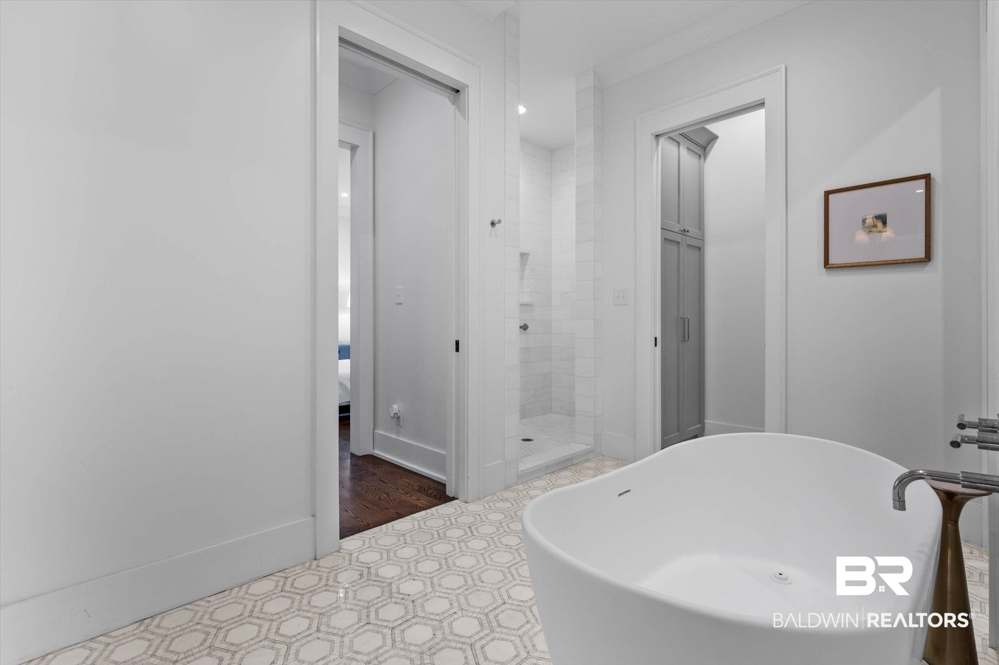 4602 Kingswood Drive Mobile, AL 36608 - Photo 17 of 45 Full bath featuring a soaking tub, a stall shower, and ensuite bathroom