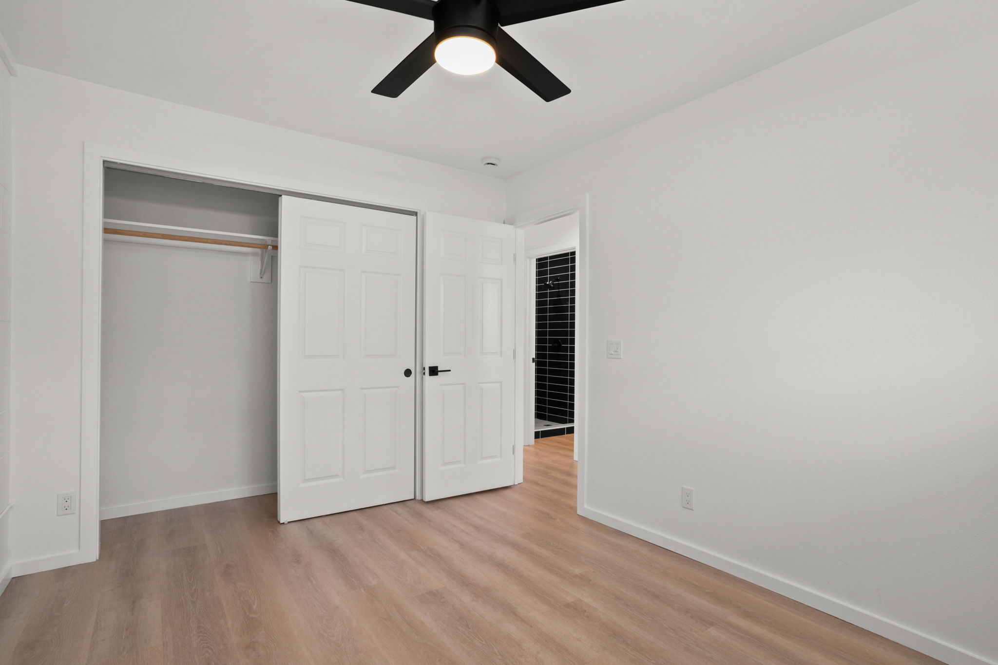4484 Panako Road Waimea, HI 96796 - Photo 14 of 27 a view of an empty room with wooden floor
