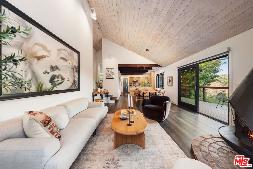 19806 Valley View Drive Topanga, CA 90290 - Photo 12 of 66 a living room with furniture and a large window