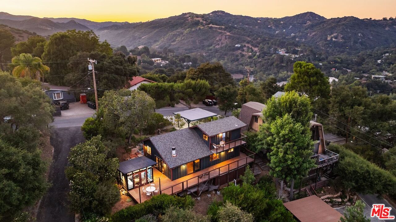 19806 Valley View Drive Topanga, CA 90290 - Photo 2 of 66 an aerial view of a house with mountain view