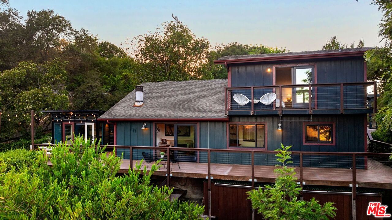 19806 Valley View Drive Topanga, CA 90290 - Photo 3 of 66 a front view of a house with garden