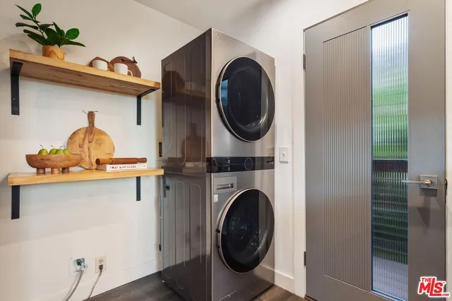 a view of balcony with wooden floor