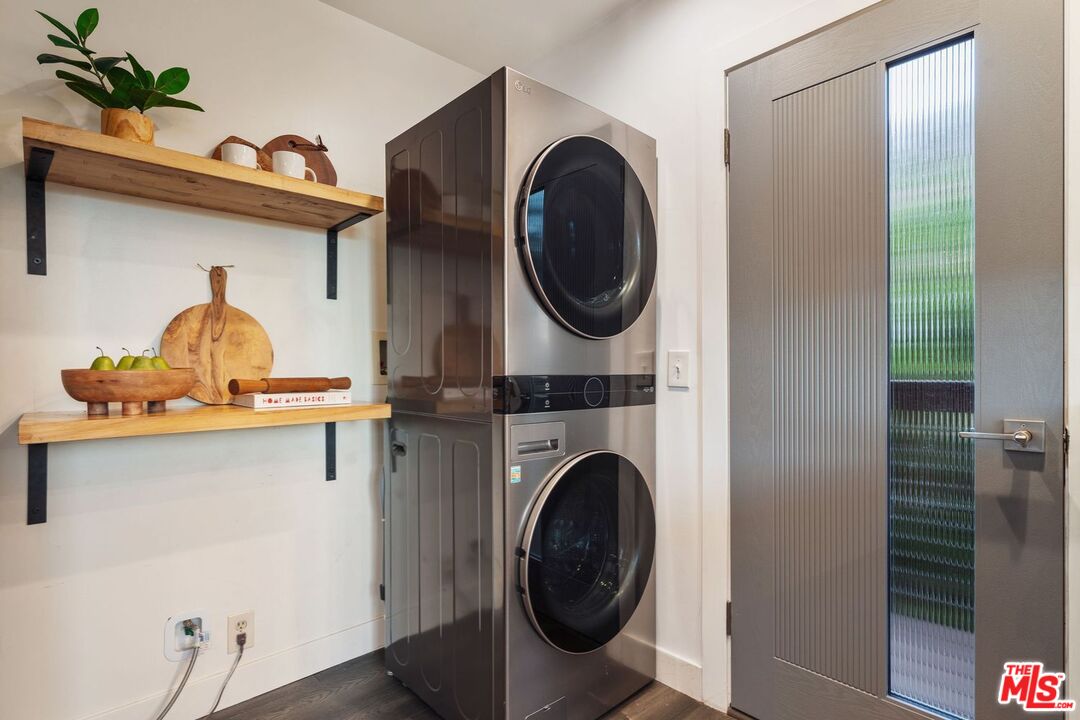19806 Valley View Drive Topanga, CA 90290 - Photo 34 of 66 a view of a hallway with washer and dryer