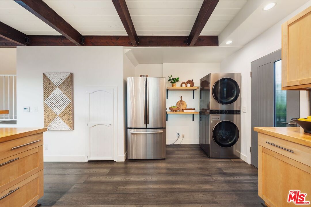 19806 Valley View Drive Topanga, CA 90290 - Photo 35 of 66 a view of a kitchen with washer and dryer
