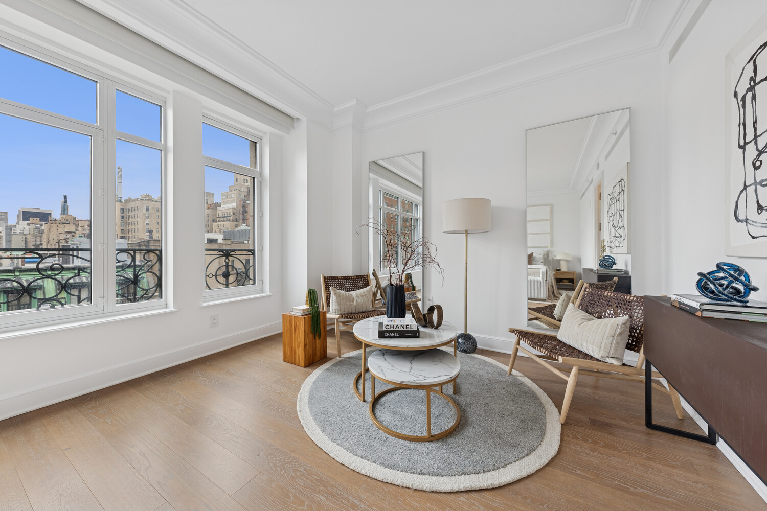 27 East 79th Street, Unit DUPLEX7/8 Manhattan, NY 10075 - Photo 10 of 20 a living room with furniture window and wooden floor
