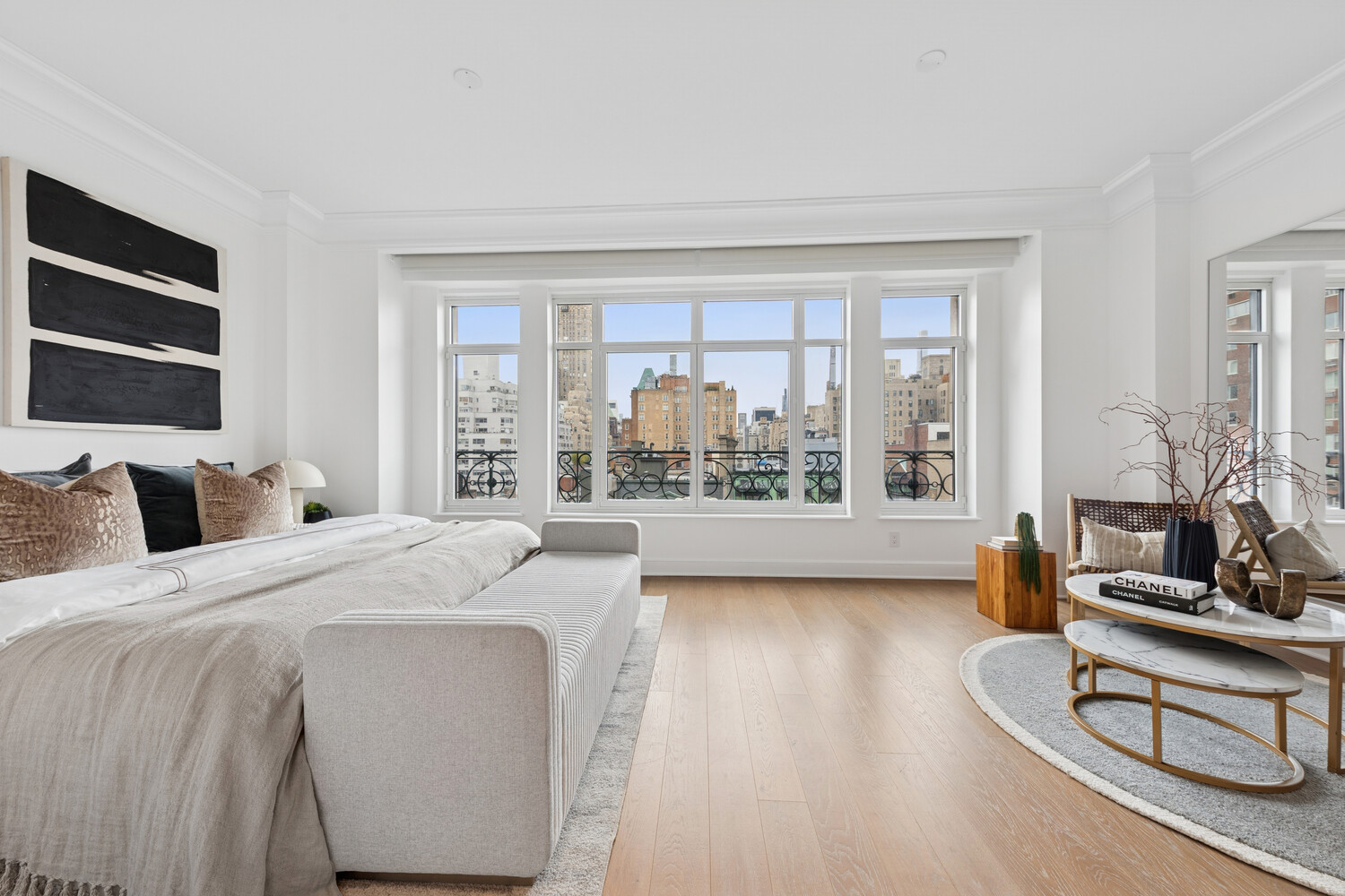 27 East 79th Street, Unit DUPLEX7/8 Manhattan, NY 10075 - Photo 8 of 20 a living room with furniture and a large window