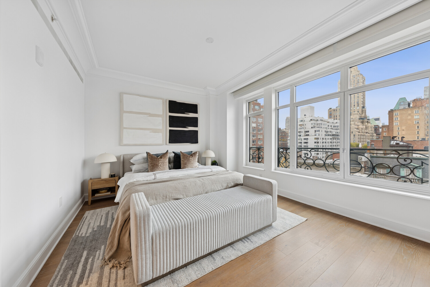 27 East 79th Street, Unit DUPLEX7/8 Manhattan, NY 10075 - Photo 9 of 20 a bedroom with a large bed and a large window