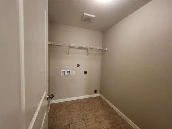 a view of a room with rack on the wall