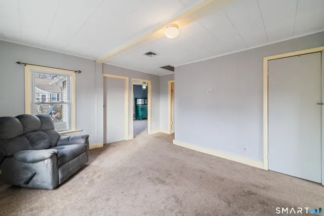 a view of a livingroom with furniture