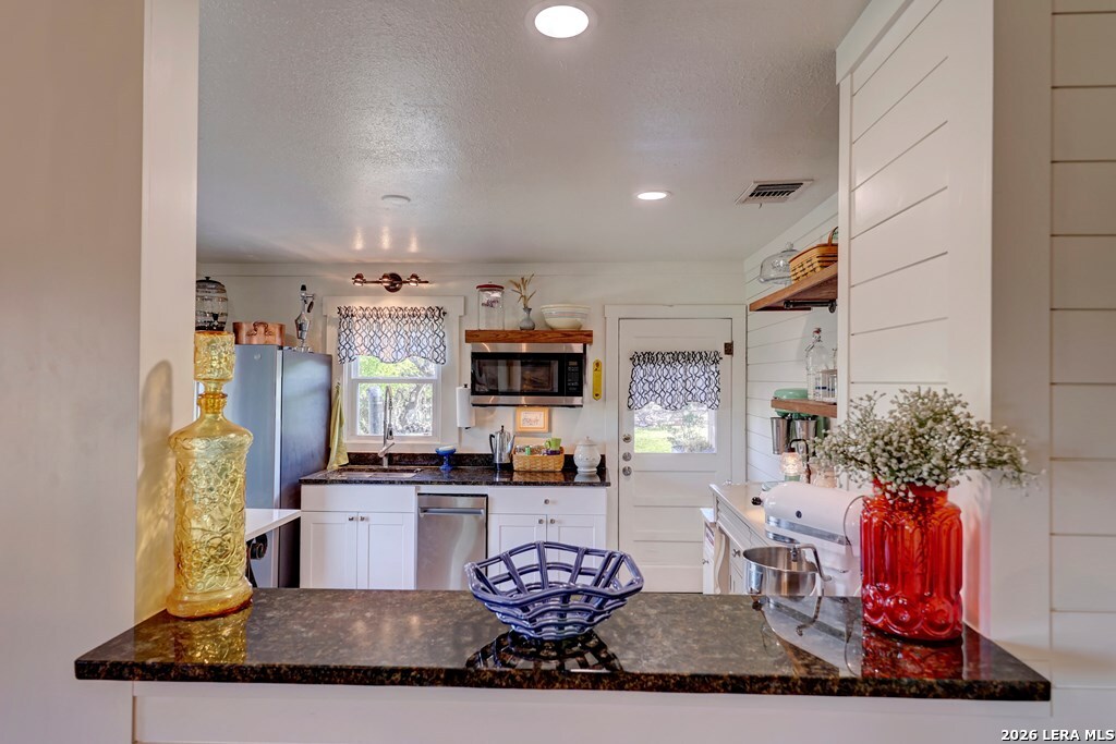 283 2nd Street Harper, TX 78631 - Photo 15 of 46 a view of living room kitchen and dining area