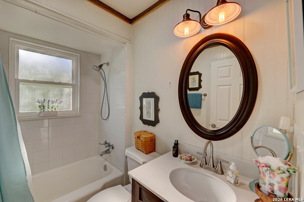 283 2nd Street Harper, TX 78631 - Photo 21 of 46 a bathroom with a sink and a mirror
