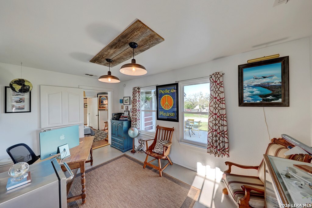 283 2nd Street Harper, TX 78631 - Photo 23 of 46 a view of a livingroom with furniture and a ceiling fan