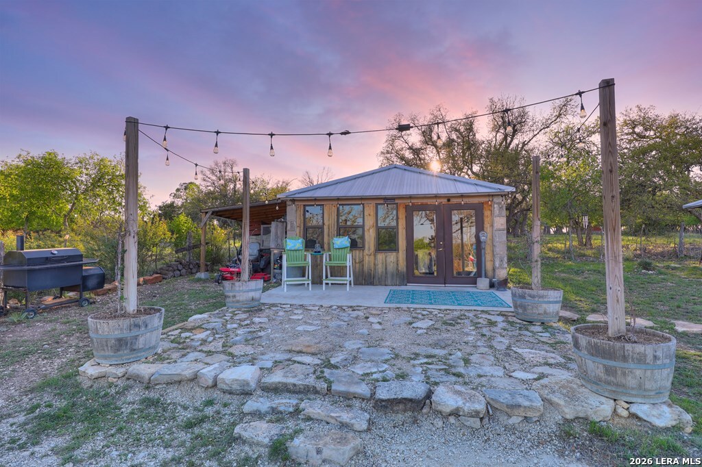 283 2nd Street Harper, TX 78631 - Photo 28 of 46 a front view of a house with garden