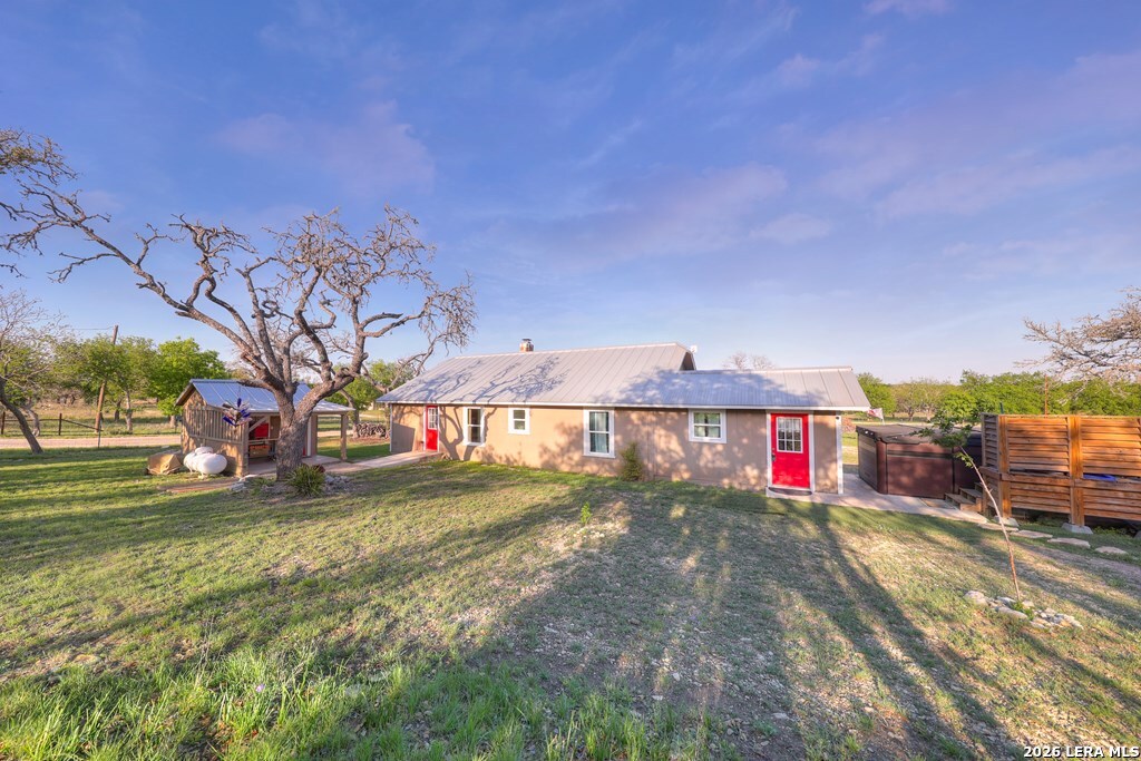 283 2nd Street Harper, TX 78631 - Photo 33 of 46 a view of an empty room with a yard