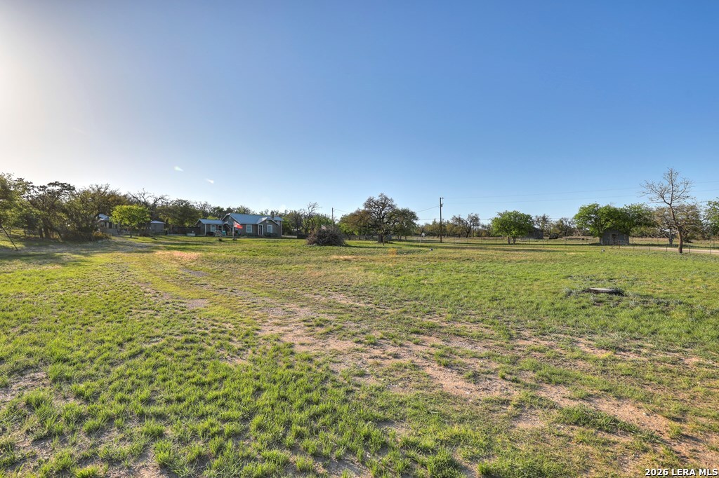 283 2nd Street Harper, TX 78631 - Photo 36 of 46 a view of a ocean with houses in the back