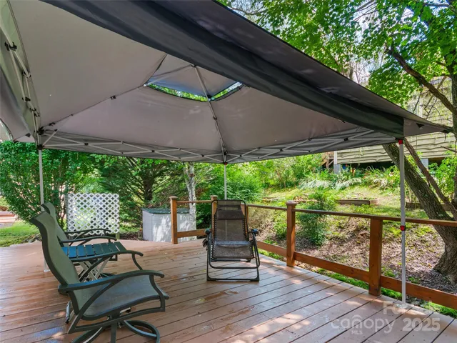 a patio with table and chairs
