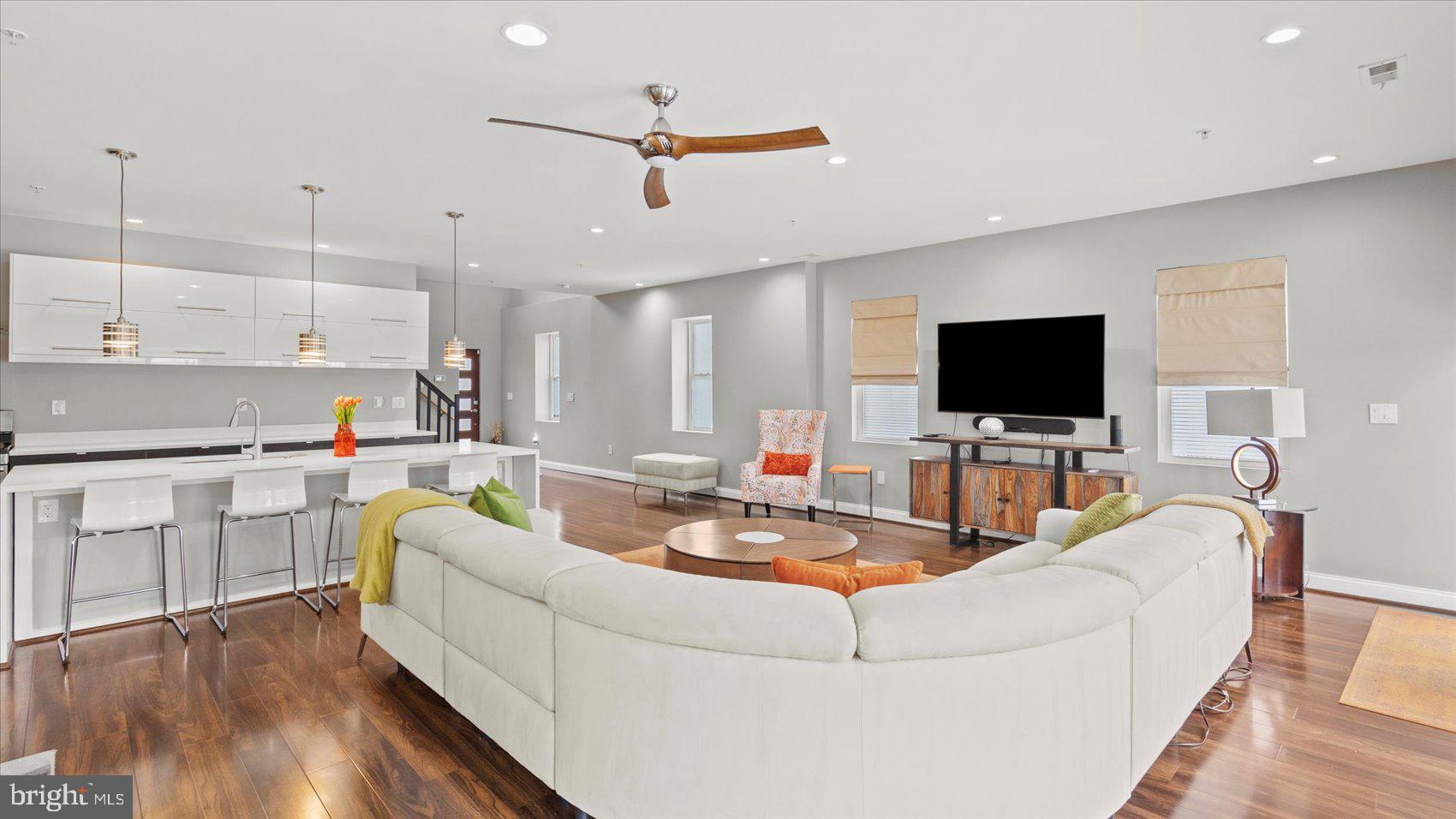 3145 Baybriar Road Dundalk, MD 21222 - Photo 27 of 54 a living room with furniture and a flat screen tv