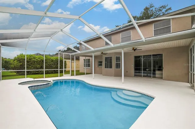 a view of a house with a swimming pool