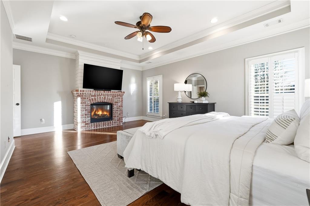 18 Starlight Drive Cartersville, GA 30121 - Photo 23 of 74 a spacious bedroom with a bed and a flat screen tv