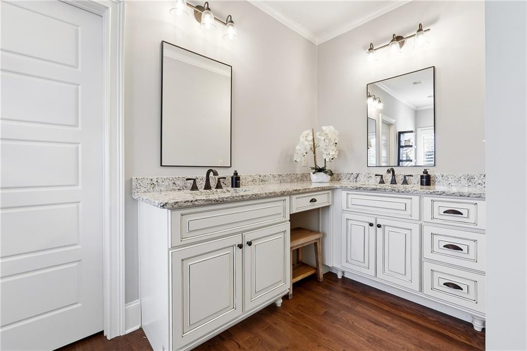 18 Starlight Drive Cartersville, GA 30121 - Photo 24 of 74 a bathroom with a sink vanity and mirror
