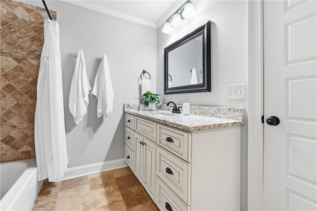 18 Starlight Drive Cartersville, GA 30121 - Photo 35 of 74 a bathroom with double vanity sink and a mirror