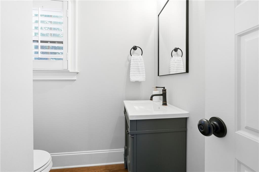 18 Starlight Drive Cartersville, GA 30121 - Photo 39 of 74 a bathroom with a sink and a mirror
