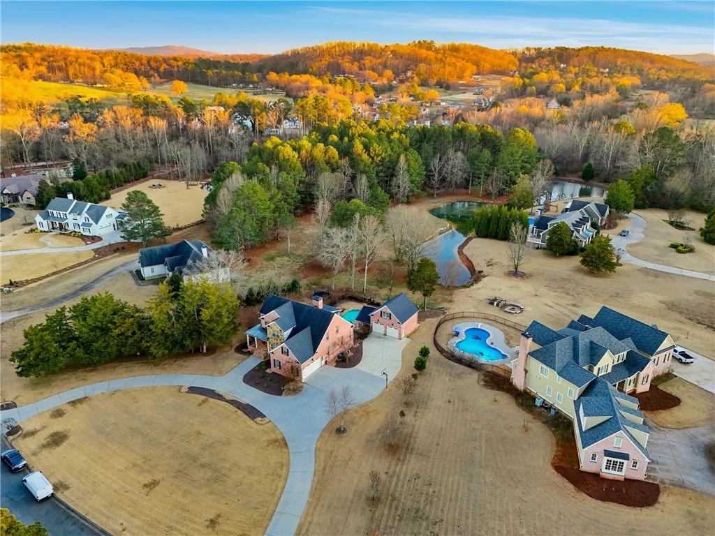18 Starlight Drive Cartersville, GA 30121 - Photo 70 of 74 an aerial view of a swimming pool with a yard