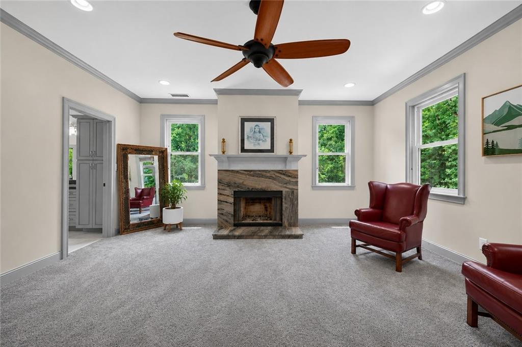 632 Geiger Road Jefferson, GA 30549 - Photo 28 of 55 a living room with furniture and a fireplace