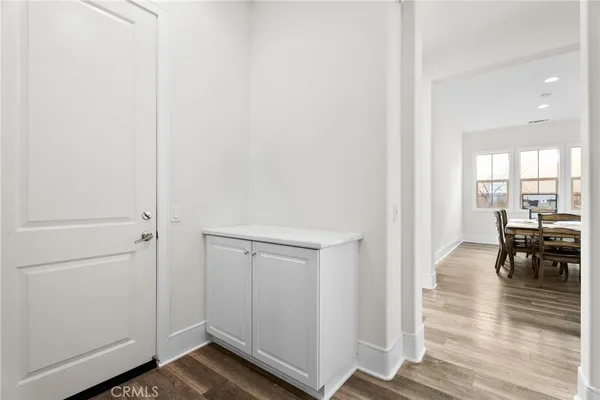 a view of dining room with wooden floor