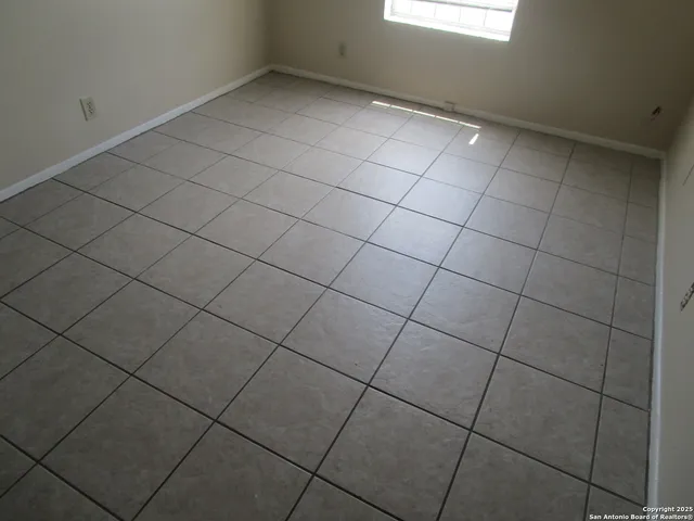 a view of a room and has window