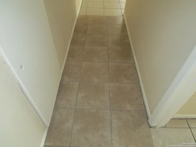 a bathroom with a sink and a shower