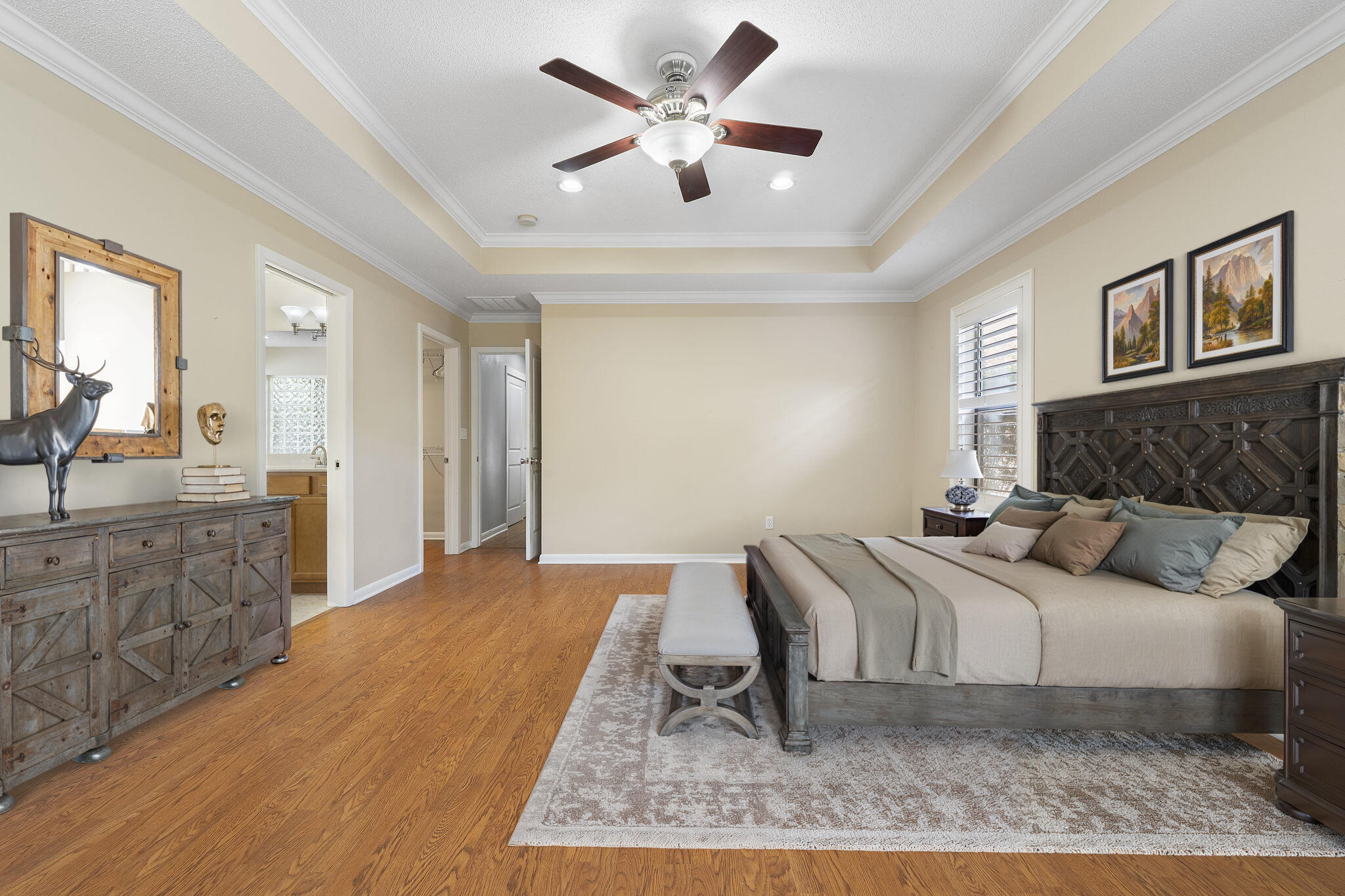 12 Hillcrest Drive Shalimar, FL 32579 - Photo 20 of 45 a bed room with a bed and a chandelier