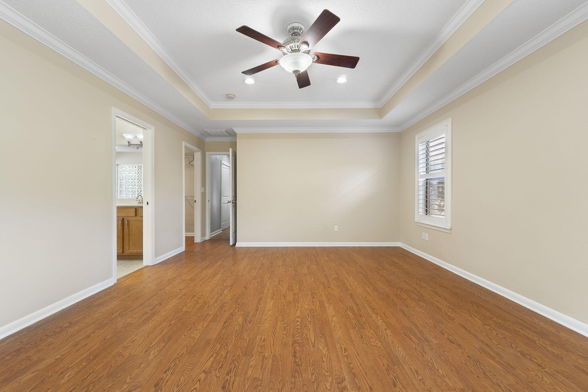 12 Hillcrest Drive Shalimar, FL 32579 - Photo 21 of 45 a view of an empty room with window and a ceiling fan