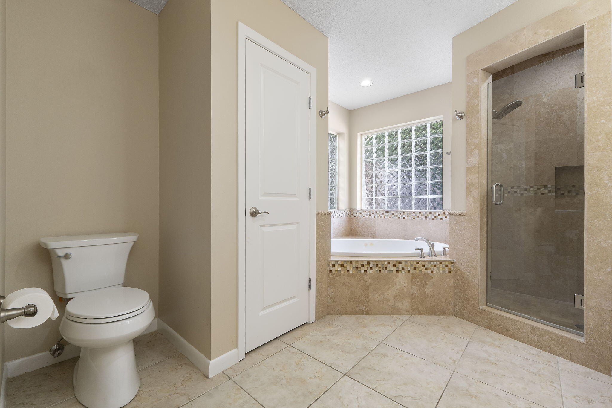 12 Hillcrest Drive Shalimar, FL 32579 - Photo 24 of 45 a bathroom with a toilet and a shower