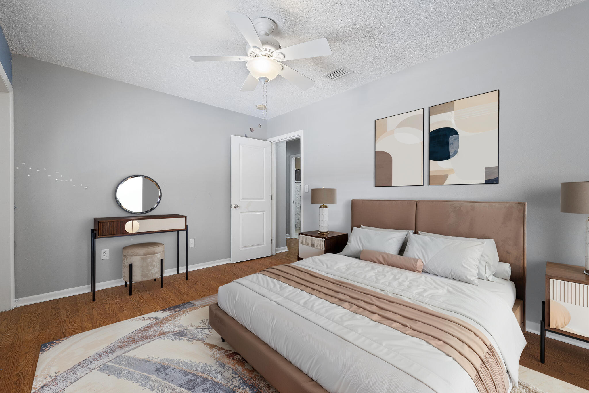 12 Hillcrest Drive Shalimar, FL 32579 - Photo 34 of 45 a bedroom with a bed and a chandelier