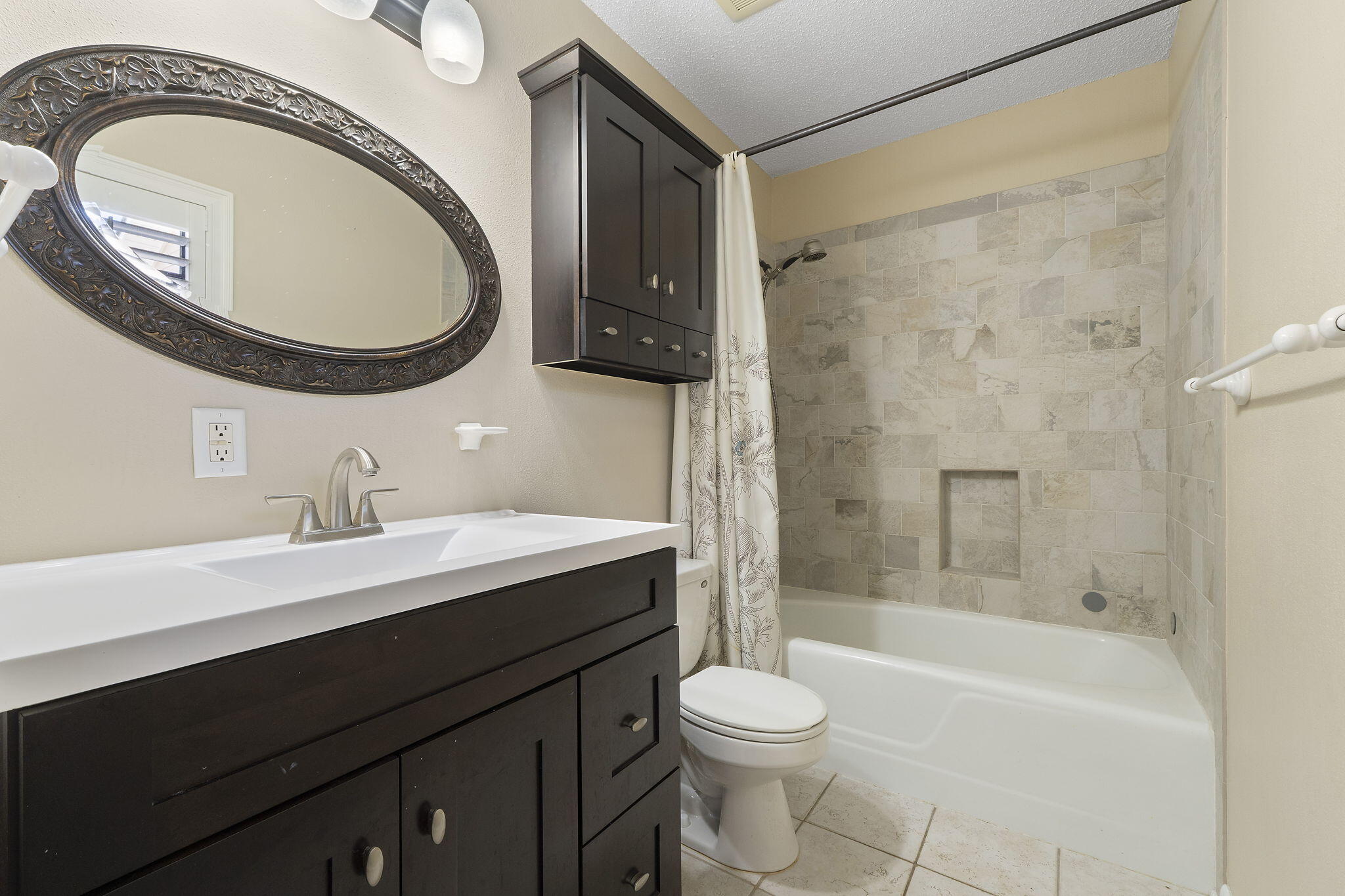 12 Hillcrest Drive Shalimar, FL 32579 - Photo 38 of 45 a bathroom with a sink a toilet and a mirror