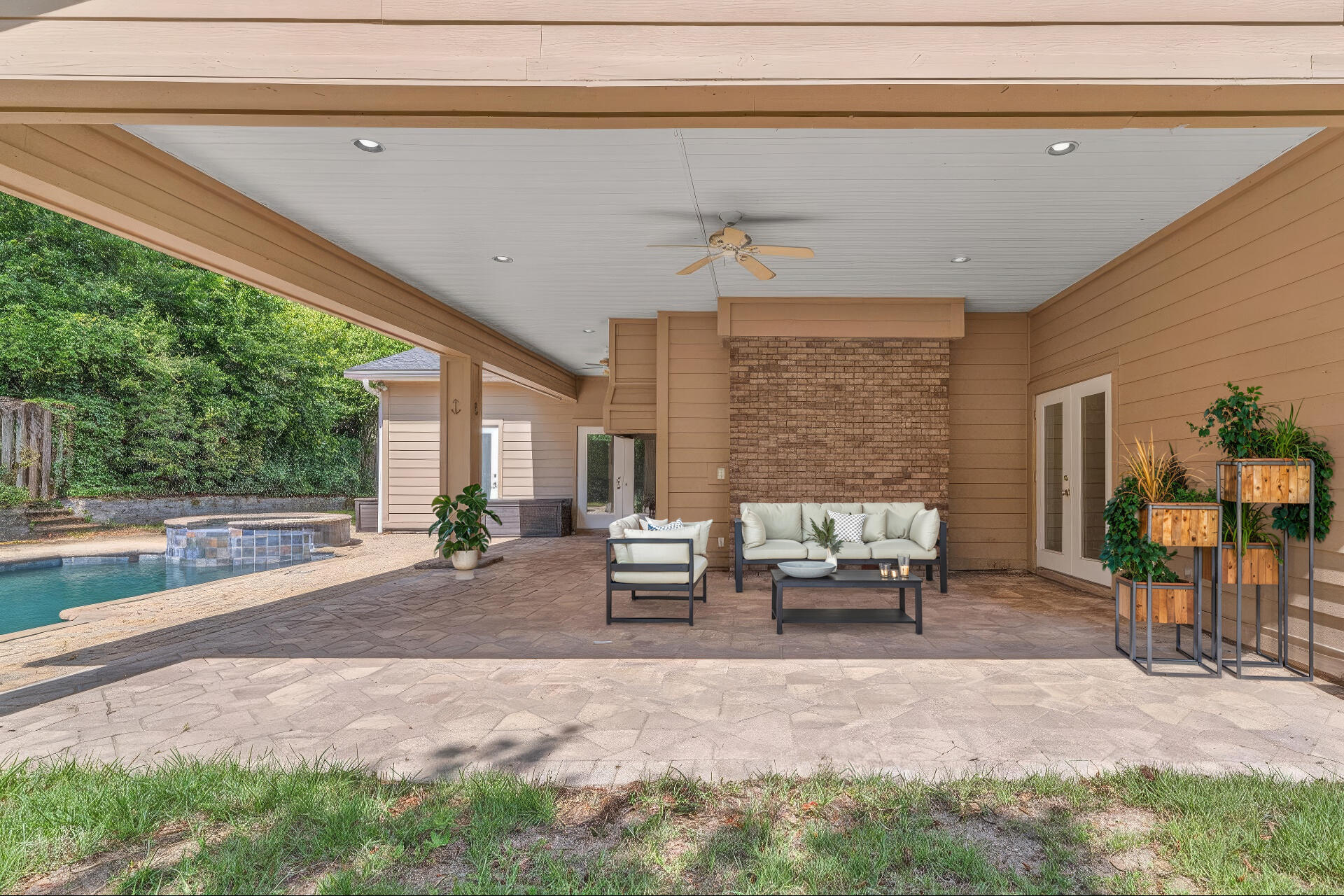 12 Hillcrest Drive Shalimar, FL 32579 - Photo 39 of 45 a building outdoor space with patio furniture and potted plants