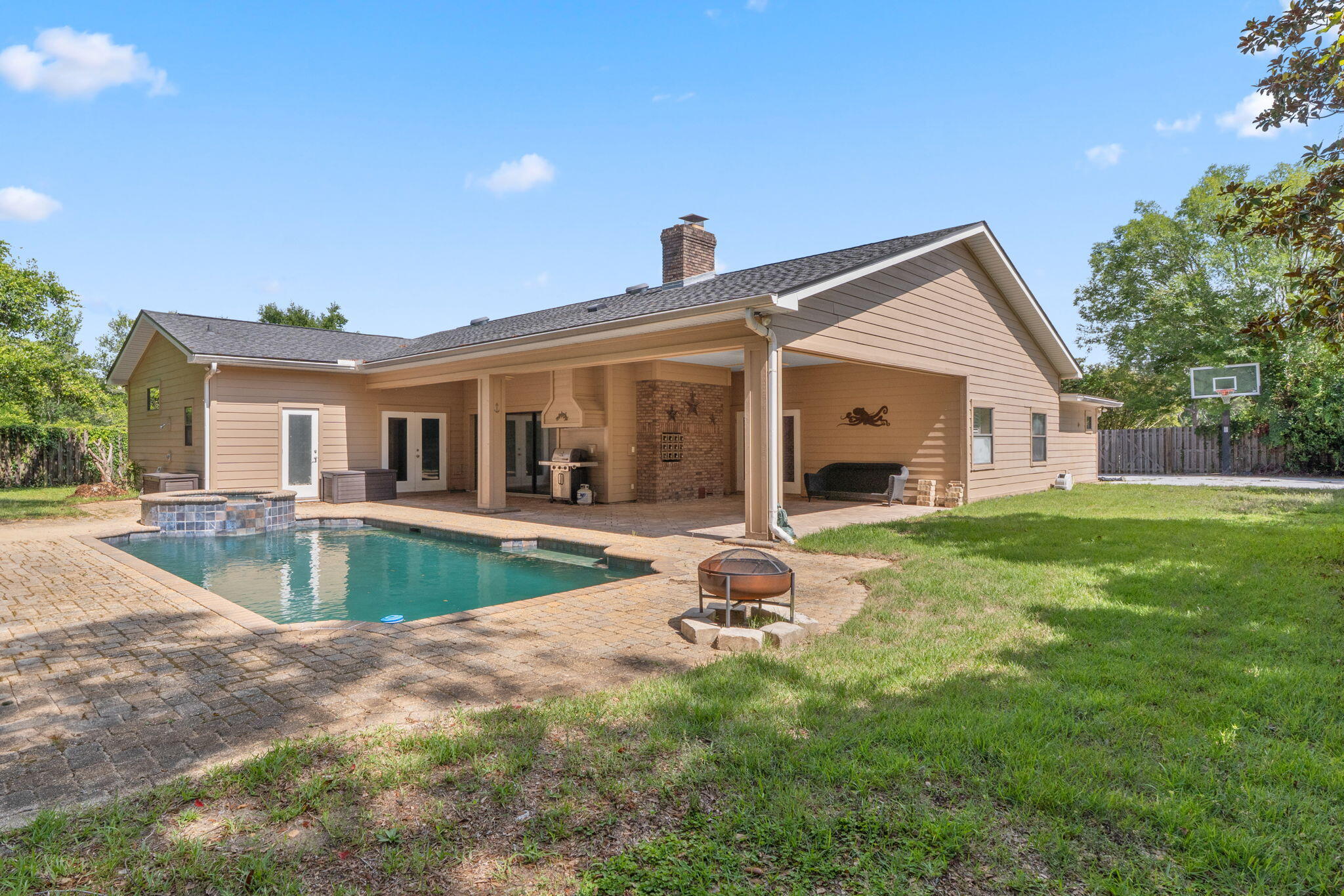 12 Hillcrest Drive Shalimar, FL 32579 - Photo 40 of 45 a view of a house with backyard porch and garden