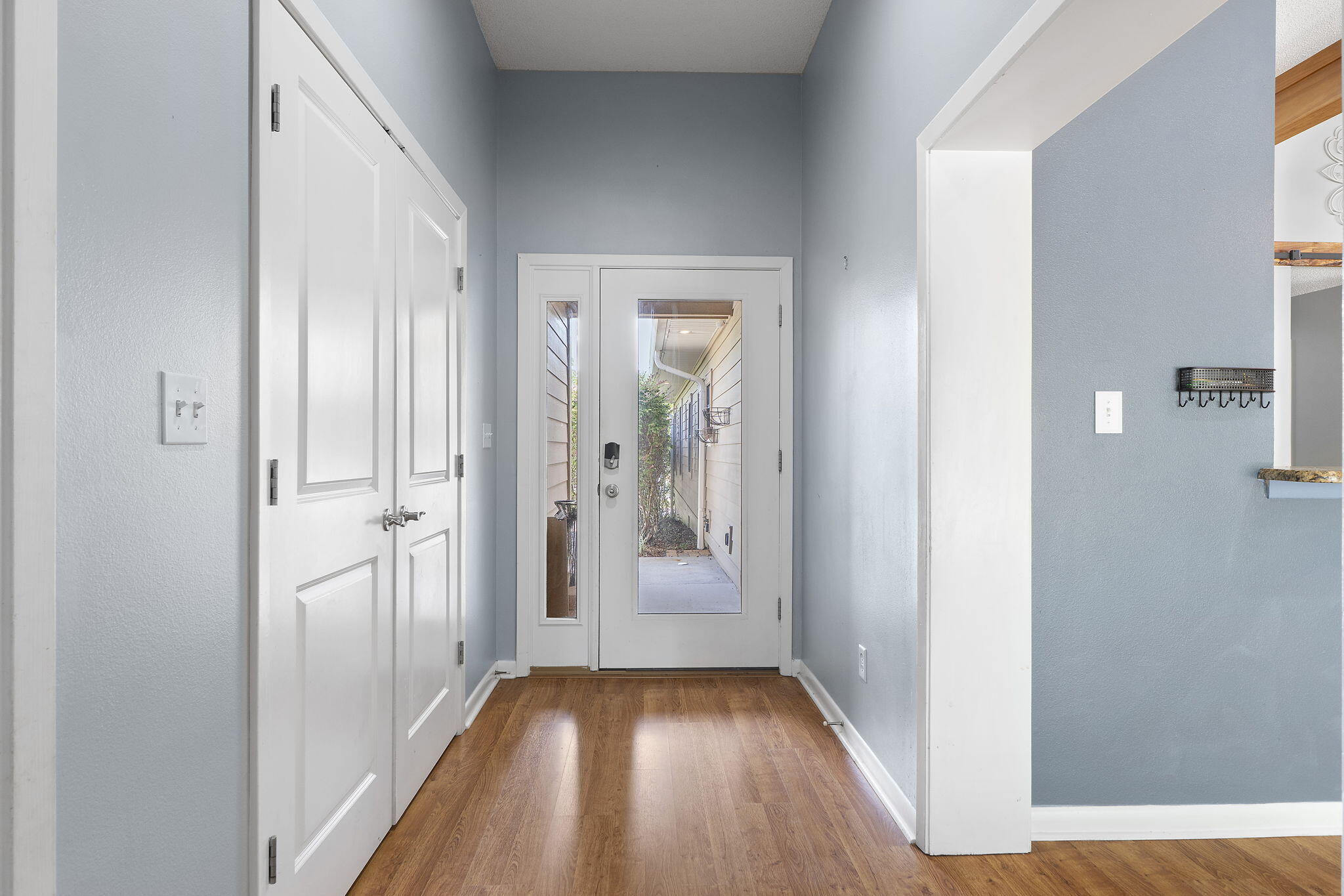 12 Hillcrest Drive Shalimar, FL 32579 - Photo 4 of 45 a view of a hallway with wooden floor