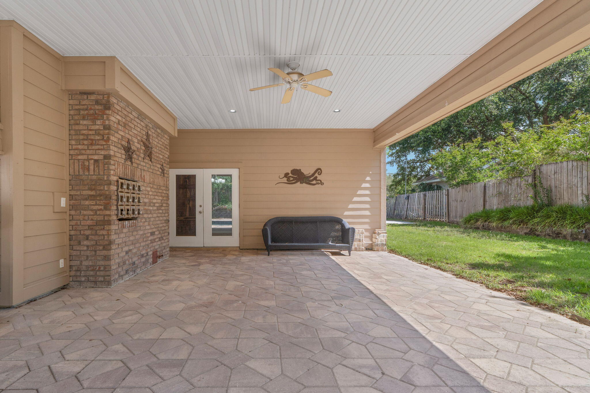 12 Hillcrest Drive Shalimar, FL 32579 - Photo 42 of 45 a view of a porch with furniture and garden