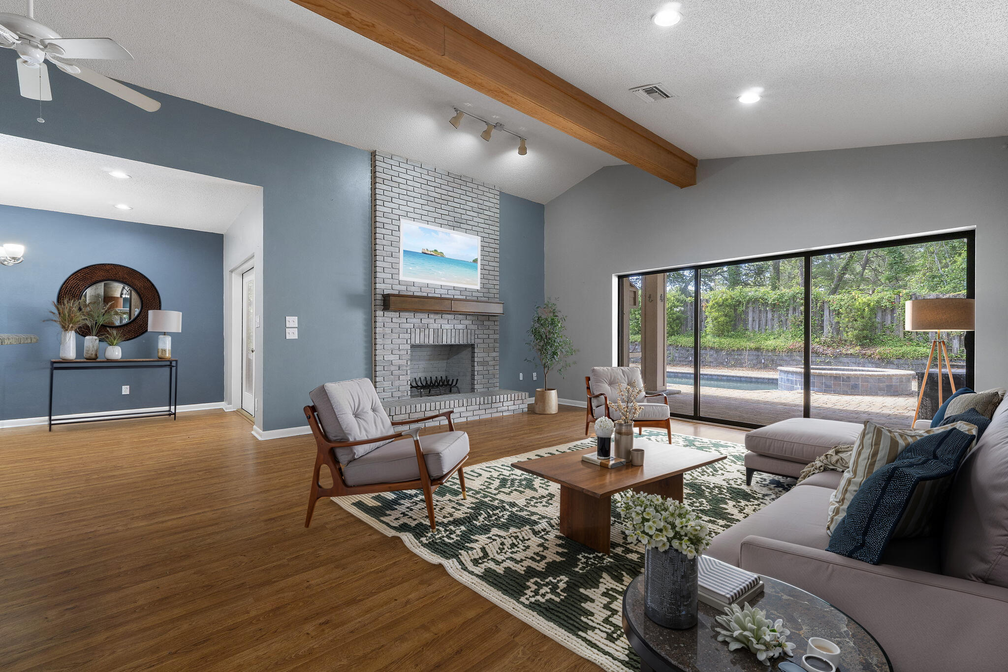 12 Hillcrest Drive Shalimar, FL 32579 - Photo 5 of 45 a living room with furniture and a floor to ceiling window