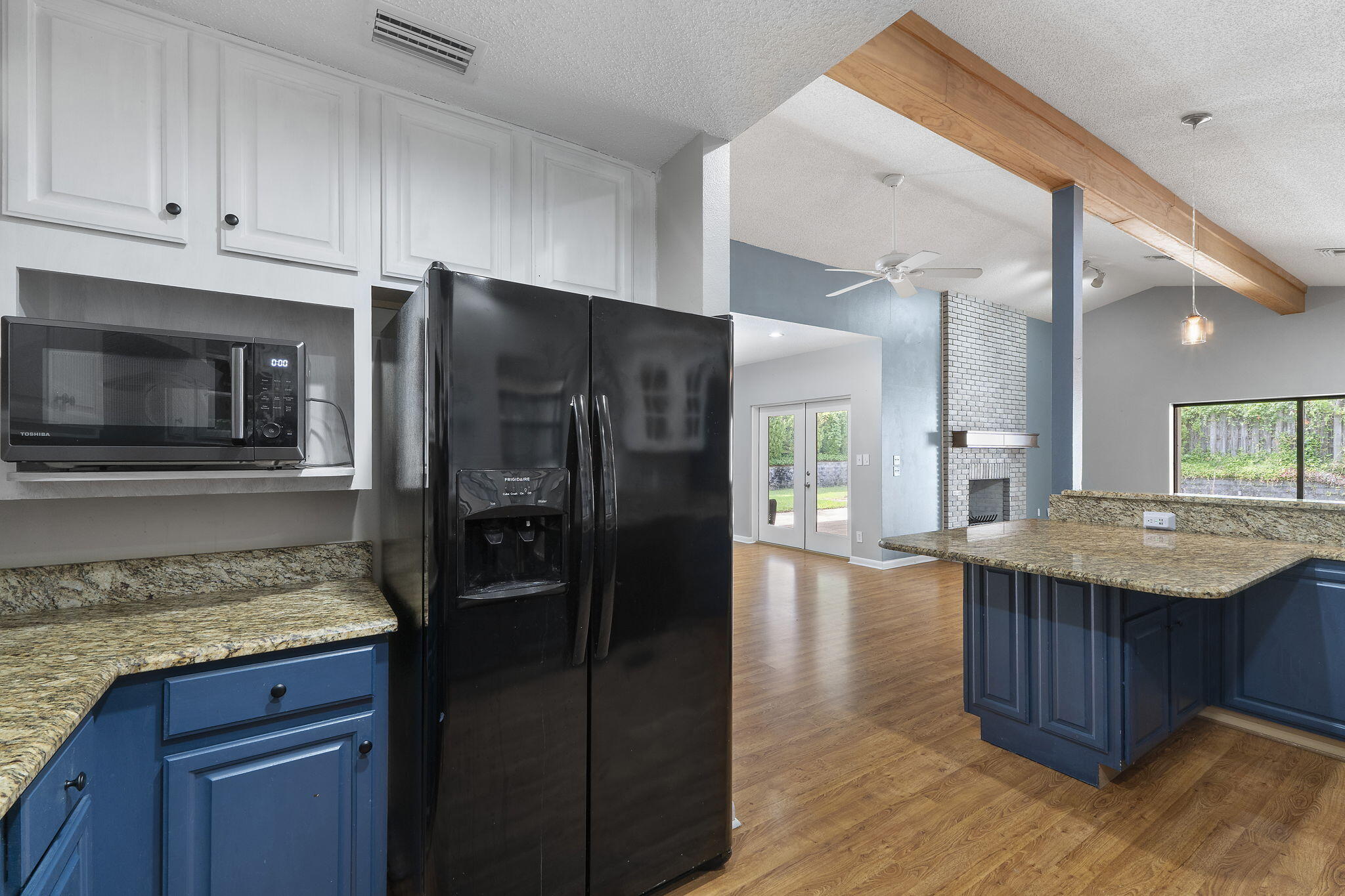 12 Hillcrest Drive Shalimar, FL 32579 - Photo 10 of 45 a kitchen with stainless steel appliances granite countertop a refrigerator and a stove